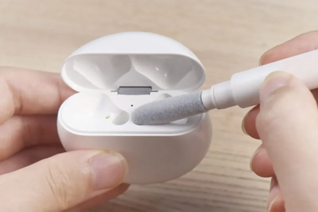 wooden toothpick to remove visible lint from the lightning port or edges