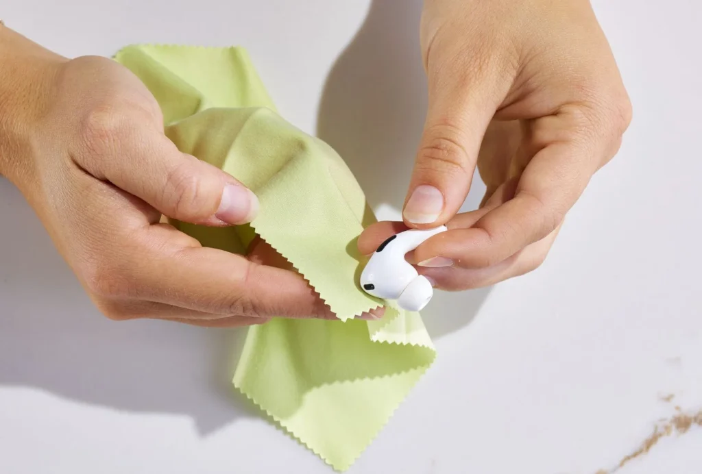 dry cotton swab to clean airpods