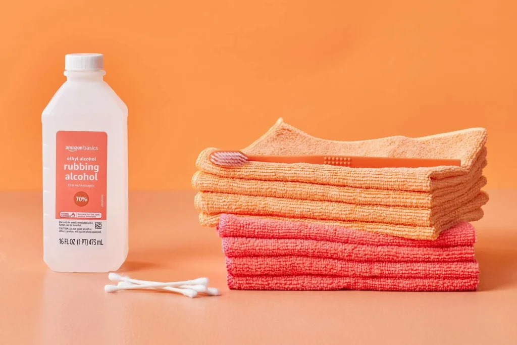 rubbing alcohol, wooden toothpick and cotton swabs