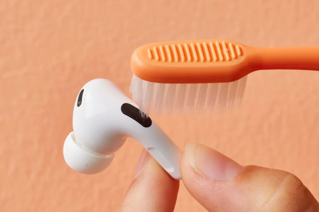 soft-bristled brush to clean airpods