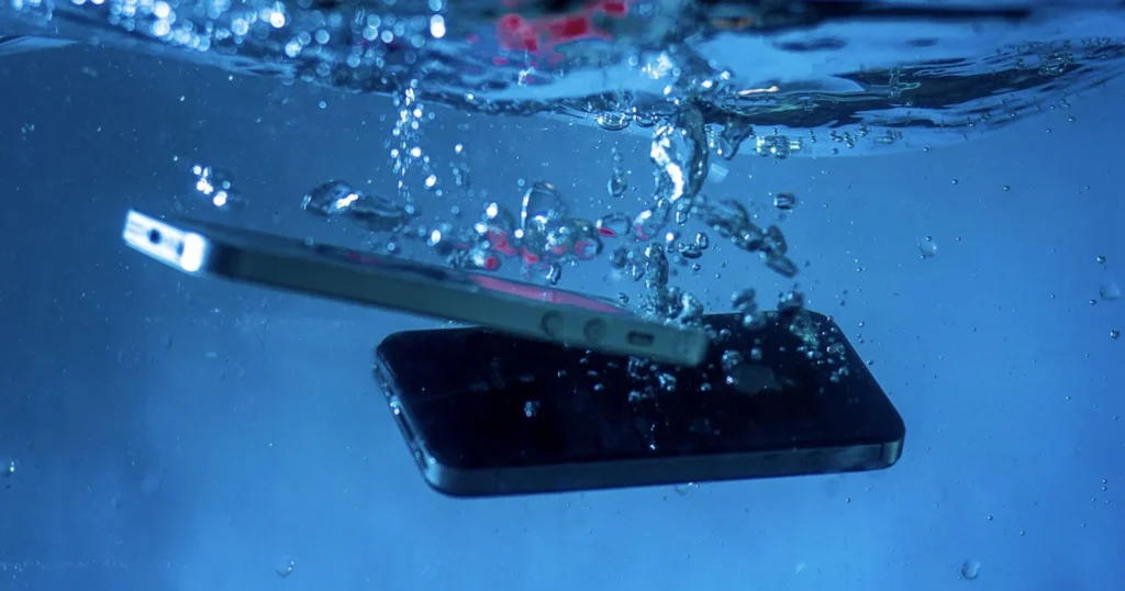 iPhone submerged in water