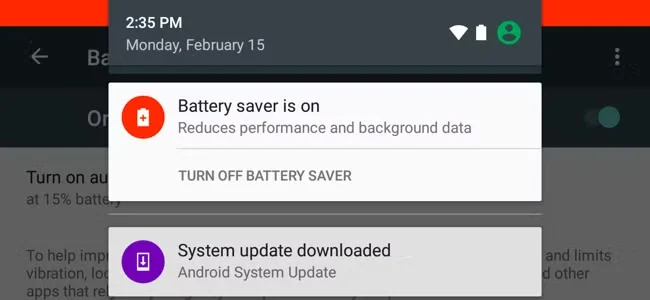 the "Battery saver" and "System update downloaded" notifications on an Android device